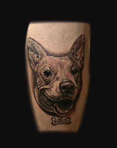 Find in between boob tattoo ideas for your next unique tattoo in Medford at Order of the Sacred Crow Tattoo And Art Emporium