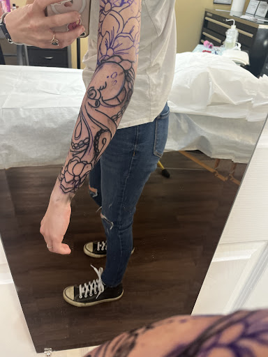 Explore hand tattoo ideas for woman, creative tattoo ideas in Richmond, available at Loose Screw Tattoo