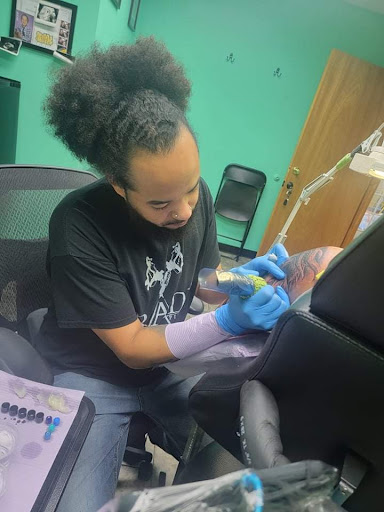 Explore men's forearm tattoo ideas, creative tattoo ideas in Fort Wayne, available at Grade A Tattoos and Body Piercing