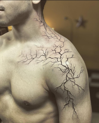 Explore kaneki tattoo ideas, creative tattoo ideas in Stevens Point, available at Black Rabbit Tattooing
