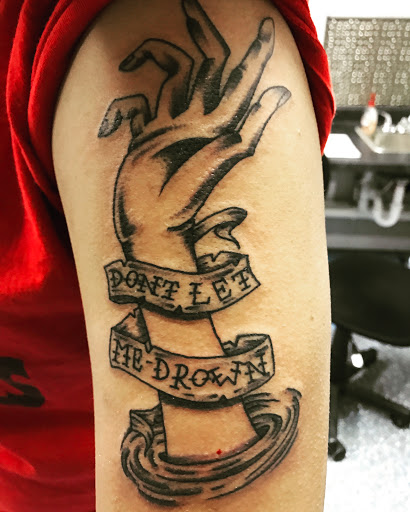 Explore tattoo ideas men sleeve, creative tattoo ideas in Muncie, available at The Tattoo Studio