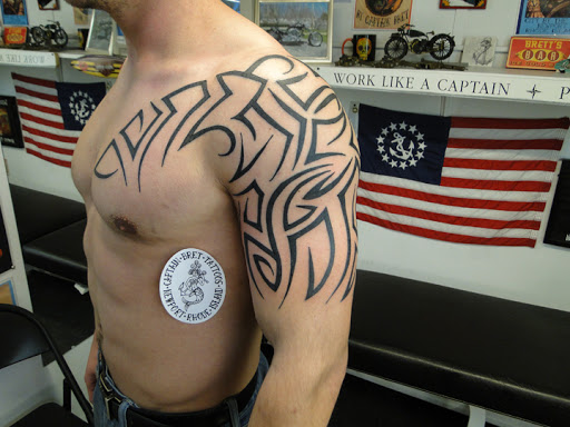 Explore son and mother tattoos ideas, creative tattoo ideas in Newport, available at Tattoos by Captain Bret