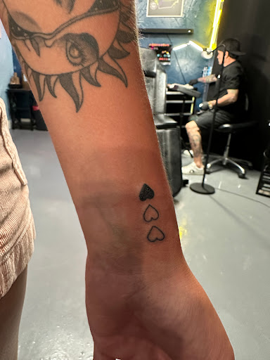 Explore cute behind the ear tattoo ideas, creative tattoo ideas in Merritt Island, available at Surfing Samurai Tattoo