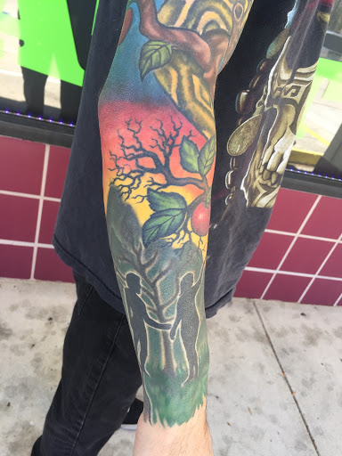 Explore tattoo cross ideas for men, creative tattoo ideas in Jacksonville, available at Electric Legacy Tattoo