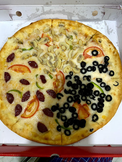 Pizza Di Mina. - souq waqif, Doha, Qatar