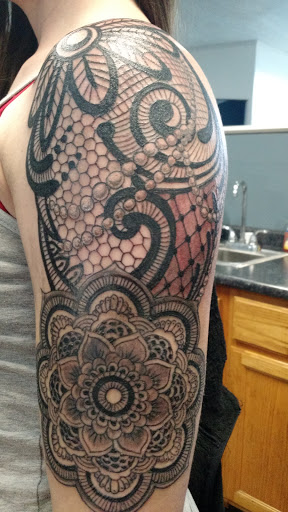 Explore unique sleeve tattoo ideas, creative tattoo ideas in Pittsfield, available at Detail and Color Tattoo