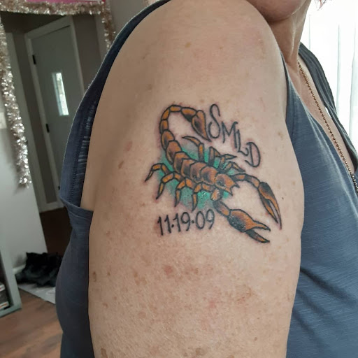 Explore forearm tattoo cover up ideas, creative tattoo ideas in Milwaukee, available at Atomic Tattoos