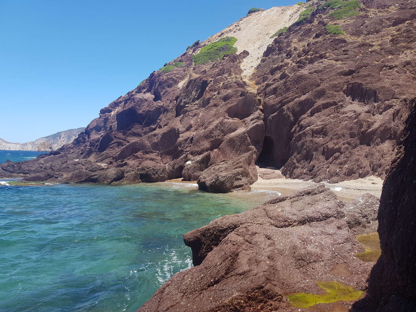 Porto Raffa Beach'in fotoğrafı doğal alan içinde bulunmaktadır