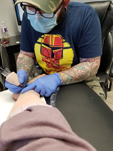 Find tattoo drawing ideas for guys for your next unique tattoo in Lees Summit at Light Sleeper