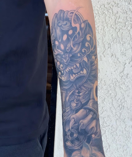 Explore tattoo sleeve black and grey ideas, creative tattoo ideas in Hesperia, available at Logic Ink Tattoo & Piercing