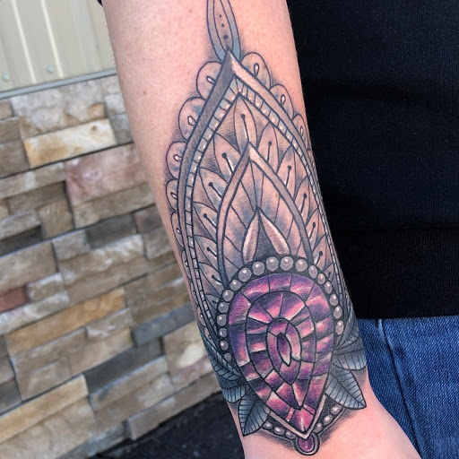 Explore small number tattoo ideas, creative tattoo ideas in Duluth, available at Gitchee Gumee Tattoo