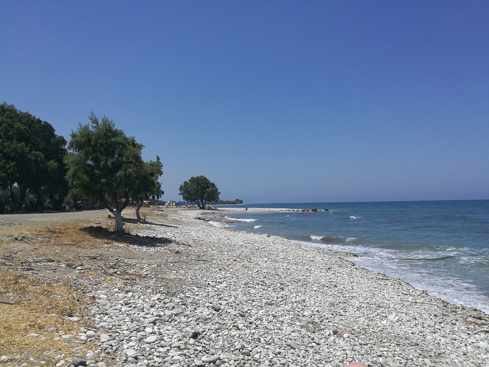 Foto van Theologos Beach met blauw water oppervlakte