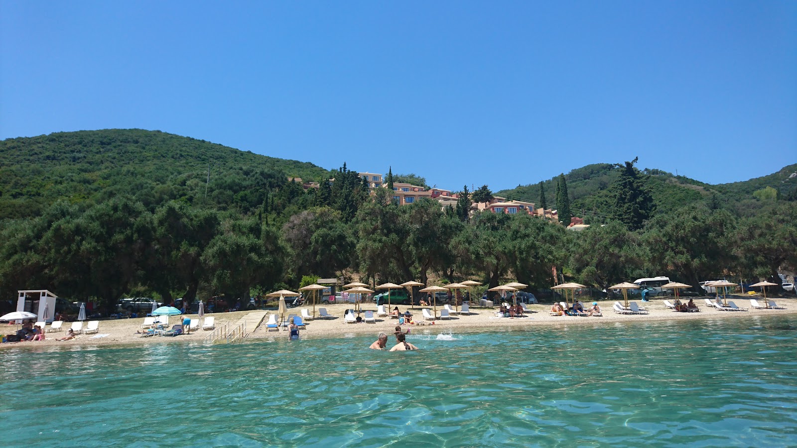 Photo of Agios Ioannis Peristeron beach and the settlement