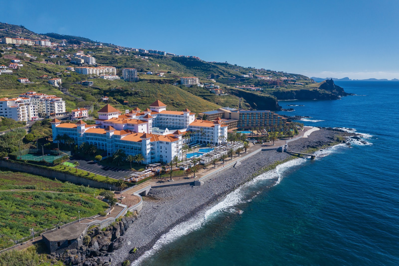 Foto di Praia dos Reis Magos con una superficie del ciottoli grigi