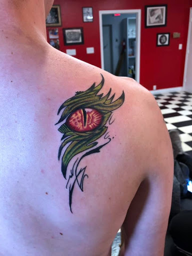Explore hand tattoo ideas for guys, creative tattoo ideas in Dunn, available at Yankee Tattoo and Piercing