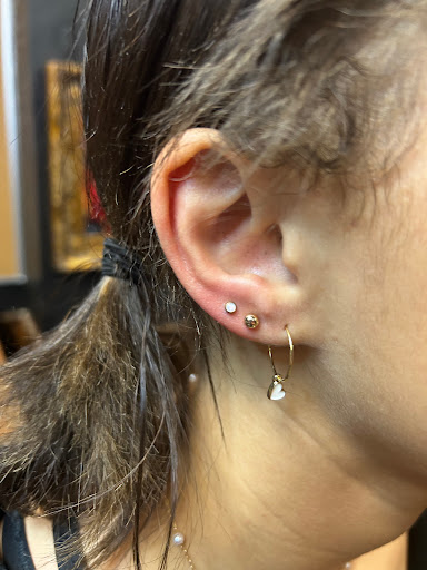 Explore tattoo ideas for females on hips, creative tattoo ideas in Dubuque, available at Julia Frank Piercing