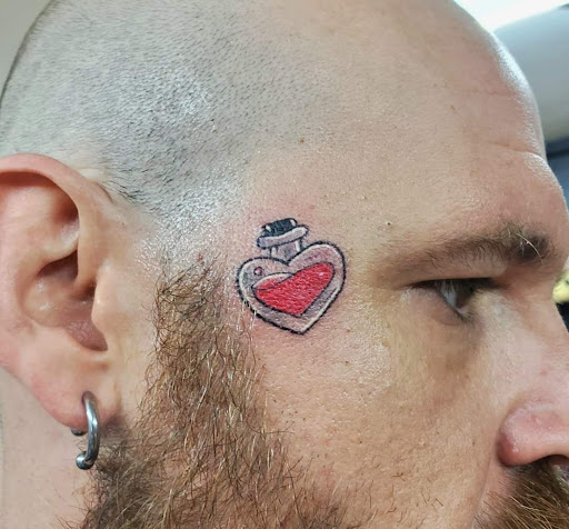 Explore liberty bell tattoo ideas, creative tattoo ideas in Benton, available at Spectrum Tattoo