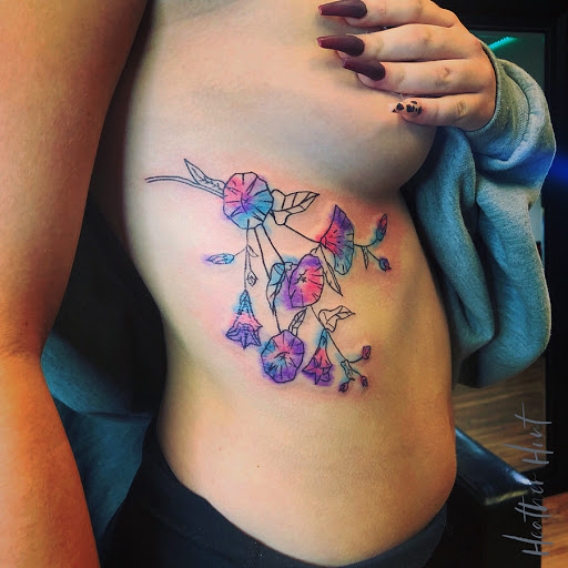Explore traditional elbow tattoo ideas, creative tattoo ideas in Broomfield, available at Wild Child Tattoo