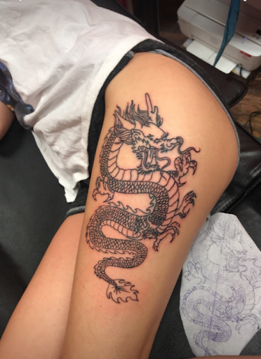 Explore cancer ribbon tattoo ideas, creative tattoo ideas in Mobile, available at Brothers Ink Tattoo Parlor