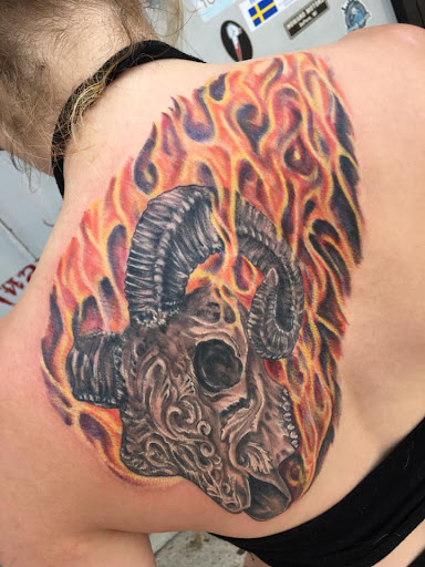 Explore tattoo ideas spine, creative tattoo ideas in Green Bay, available at Darkside Tattoo By Jesse Skywalker