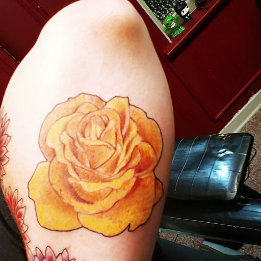 Explore men's back tattoos ideas, creative tattoo ideas in Grove City, available at Rebel Sails Tattoo