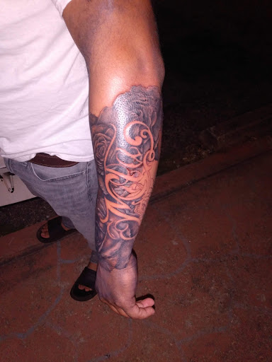Explore thigh tattoo ideas for females, creative tattoo ideas in Greenwood, available at Emerald City Tattoos