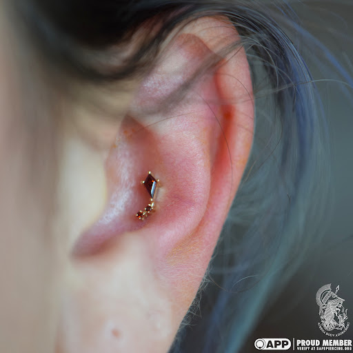 Explore om tattoo ideas, creative tattoo ideas in Pompano Beach, available at Athena Body Adornment