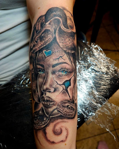 Explore 4 element tattoo ideas, creative tattoo ideas in Onalaska, available at Rock Bottom Tattoo Studio