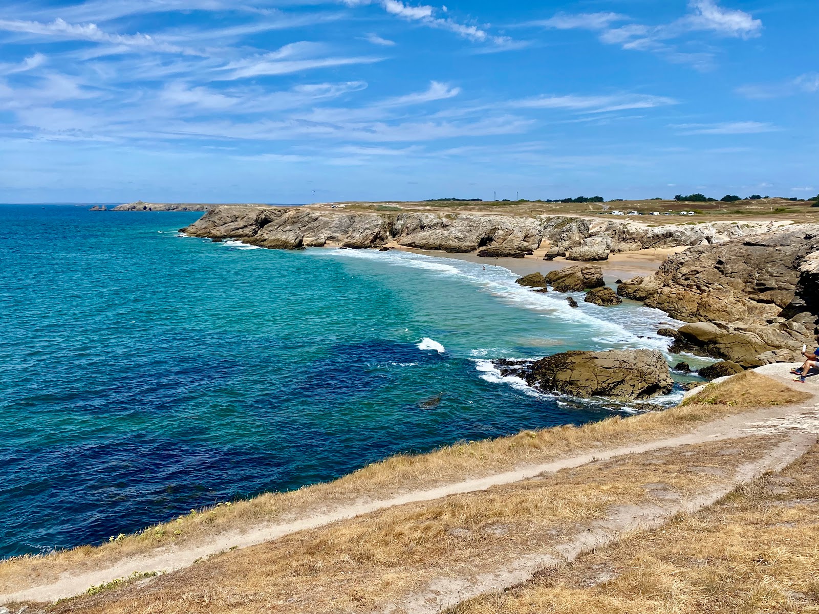 Foto von Plage de Port Goulom mit beiger sand Oberfläche