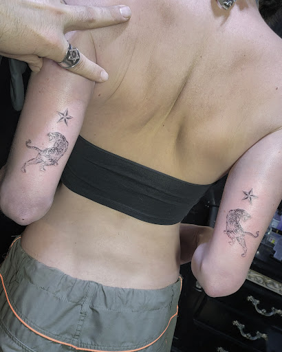 Explore cougar tattoo ideas, creative tattoo ideas in Los Angeles, available at Motis Tattoos