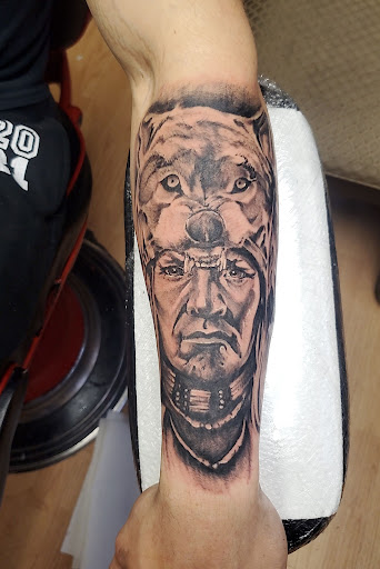 Explore german american tattoo ideas, creative tattoo ideas in Cedar Falls, available at The Iron Quill Tattoo Parlor