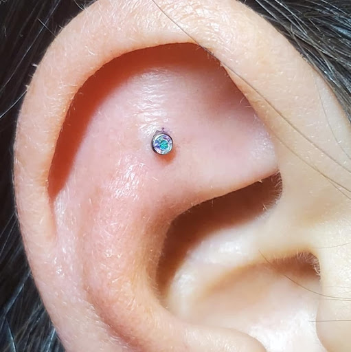 Explore tattoo ideas for children, creative tattoo ideas in Jupiter, available at Moth And Moon Tattoo