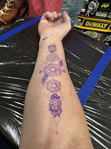 Explore ankle flower tattoo ideas, creative tattoo ideas in North Richland Hills, available at Ink Life DFW