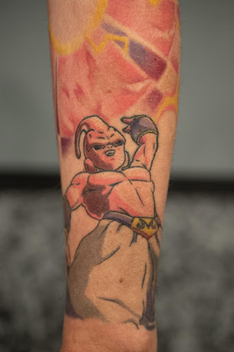 Explore last name back tattoo ideas, creative tattoo ideas in Luverne, available at Conspiracy Tattoo MN