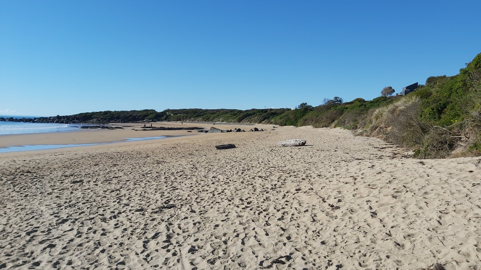 Foto de Coles Beach com areia brilhante superfície