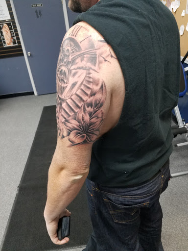 Tattoo Shop «Next Level Tattoo Company - Imlay City», reviews and photos, 420 E 3rd St, Imlay City, MI 48444, USA