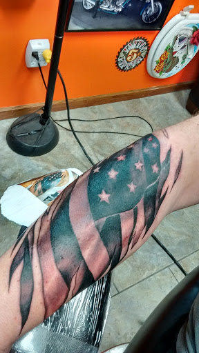 Explore tattoo ideas for women on thigh, creative tattoo ideas in Cedar Rapids, available at Wildside Tattoo and Body Piercing