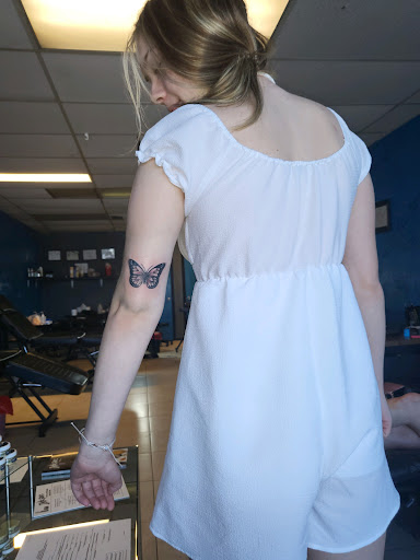 Explore nike tattoo ideas, creative tattoo ideas in Saint Petersburg, available at Ink Godz Tattoos