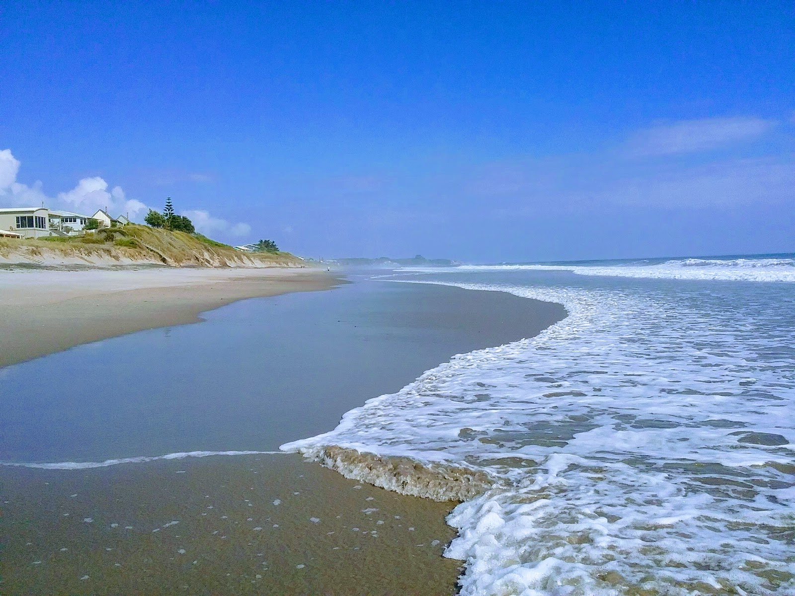 Poutuia Beach'in fotoğrafı çok temiz temizlik seviyesi ile
