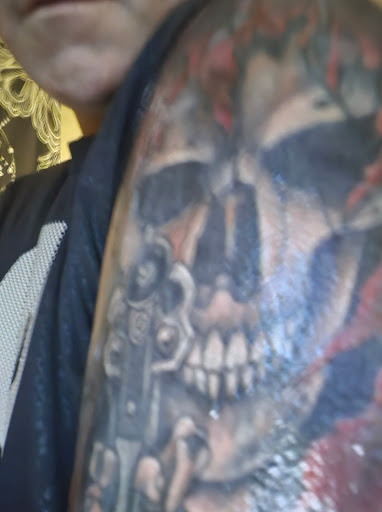 Explore hand tattoo ideas for woman, creative tattoo ideas in Largo, available at Alchemy Tattoos and Body Piercings