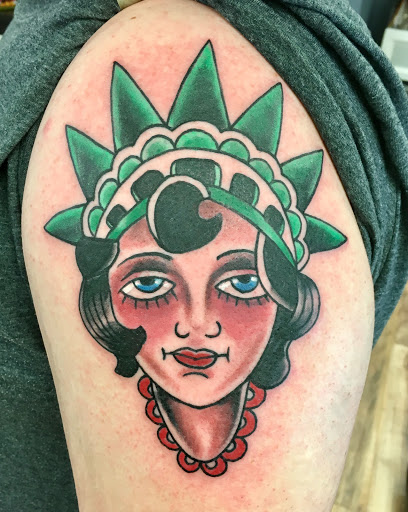 Explore best tattoo cover up ideas, creative tattoo ideas in Mchenry, available at Lunchbox Tattoo and Body Piercing