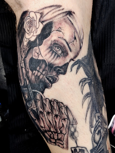 Explore skull tattoo ideas for guys, creative tattoo ideas in Savannah, available at Black Lotus Tattoo and Piercing