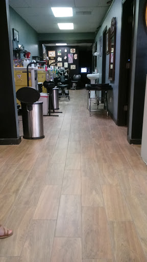 Explore tattoo sleeve filler ideas for a woman, creative tattoo ideas in Fort Pierce, available at Goodfellas Tattoo & Body Piercing