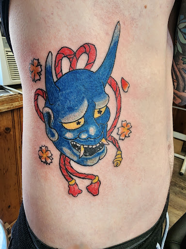 Explore thigh tattoo ideas for females, creative tattoo ideas in Charlottesville, available at ScottyrocksTwisted Inks