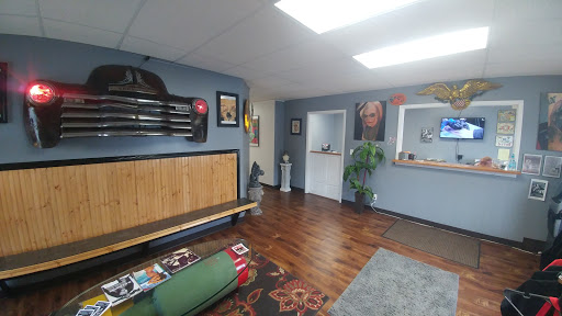 Explore small coraline tattoo ideas, creative tattoo ideas in Des Moines, available at Axiom Body Piercing Studio