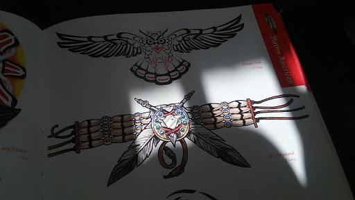 Explore men's inner bicep tattoo ideas, creative tattoo ideas in Waterloo, available at Black Lotus Tattoo Studio