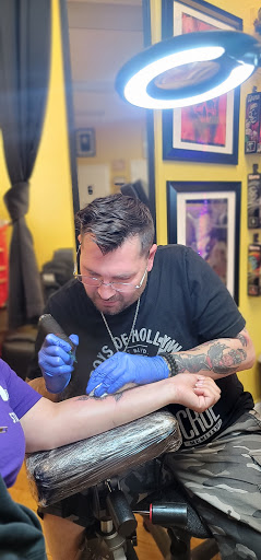 Explore tattoo hand ideas, creative tattoo ideas in Edison, available at Tattoo Asylum