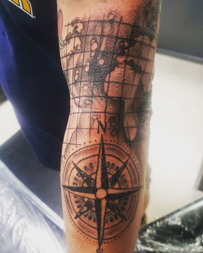 Explore lower arm tattoo ideas, creative tattoo ideas in Homosassa, available at Citrus Tattoos