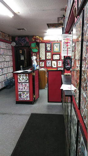 Explore ring finger tattoo ideas, creative tattoo ideas in Carmichael, available at Fat Cat Tattoo Parlour