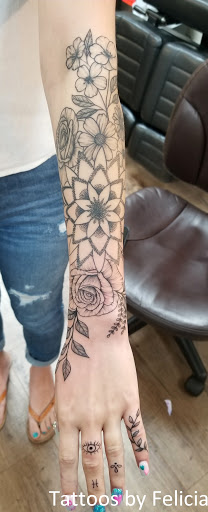 Explore small lion tattoo ideas, creative tattoo ideas in Fort Myers, available at Tiger Lotus Tattoo and Piercing